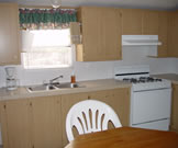 A picture of the kitchen/dining area